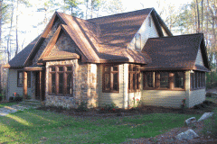 A sunroom with long Casement windows is like having a screened room. When you open the window you get the entire space screened